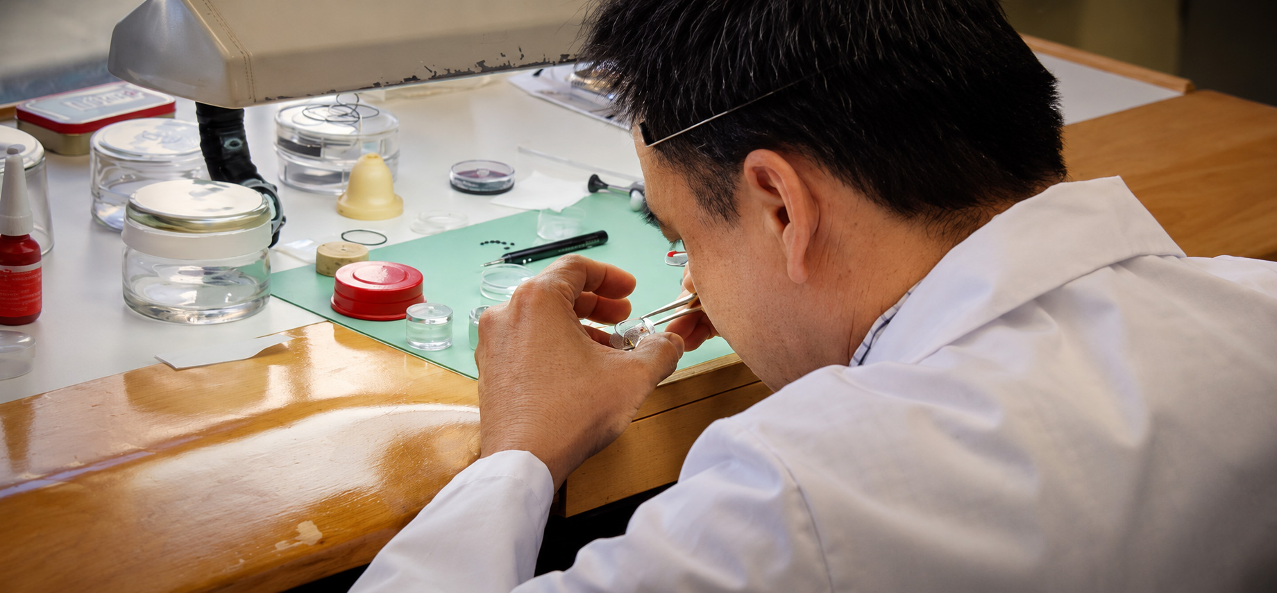 Watchmaker at work in the D's Time Service workshop